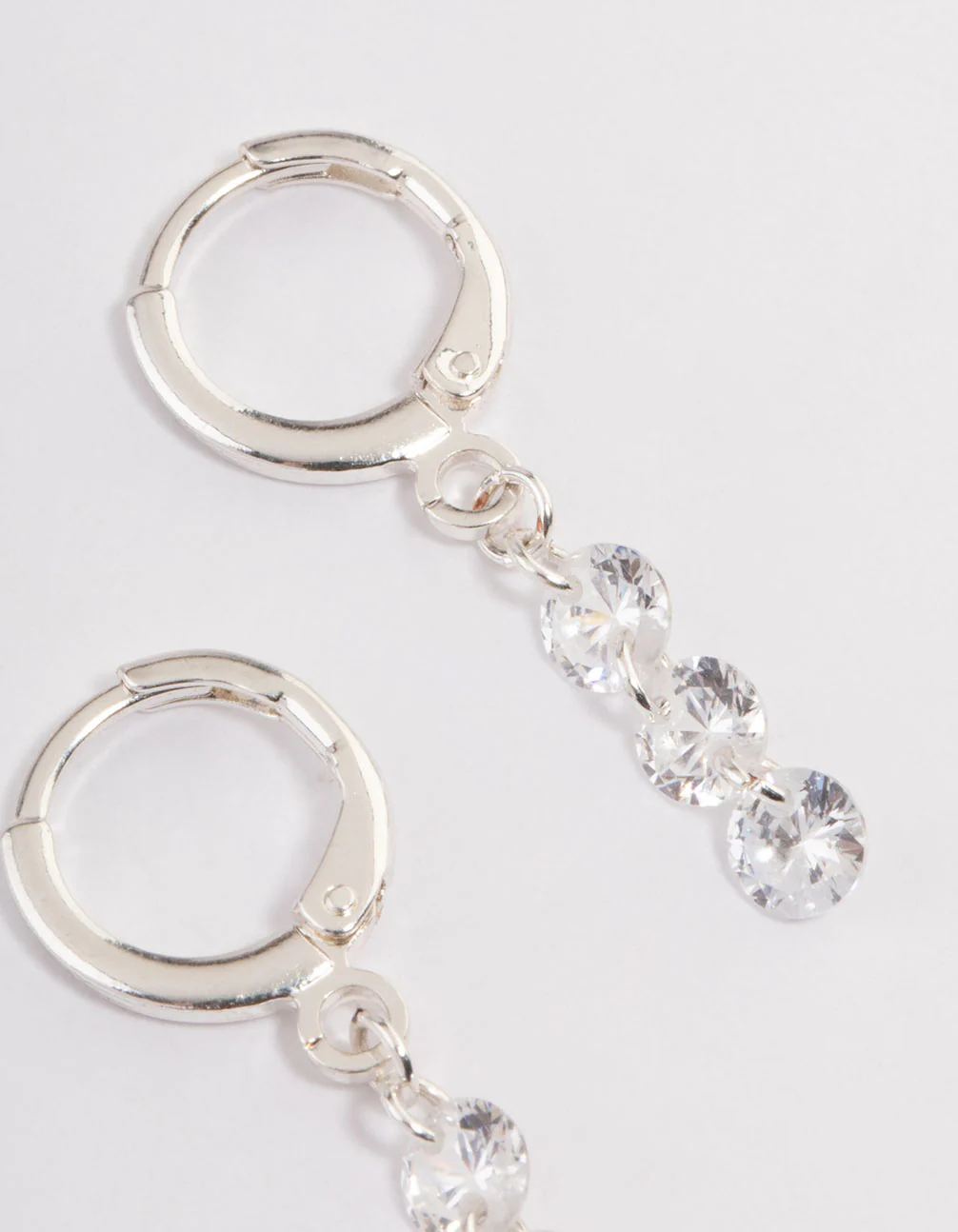 Silver Triple Floating Diamante Huggie Earrings - Image 3