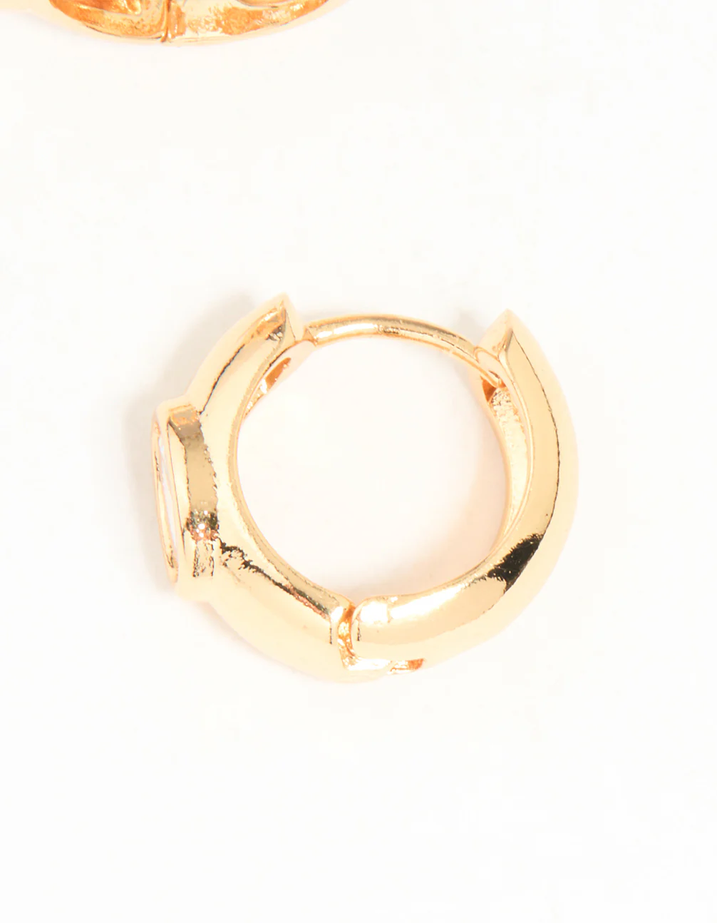 Gold Cubic Zirconia Thick Huggie Earrings - Image 5