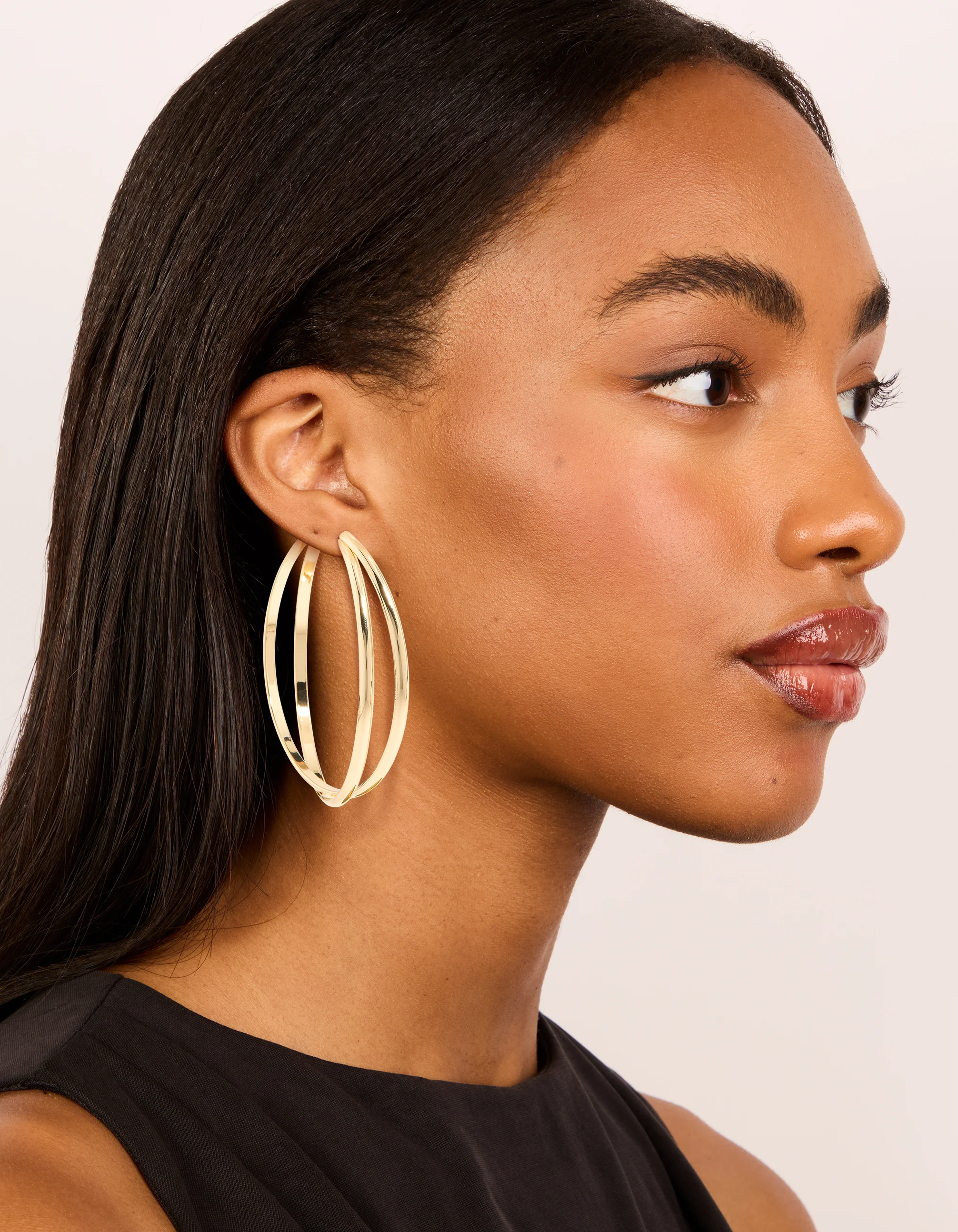 Gold Large Cross Over Hoop Earrings - Image 3