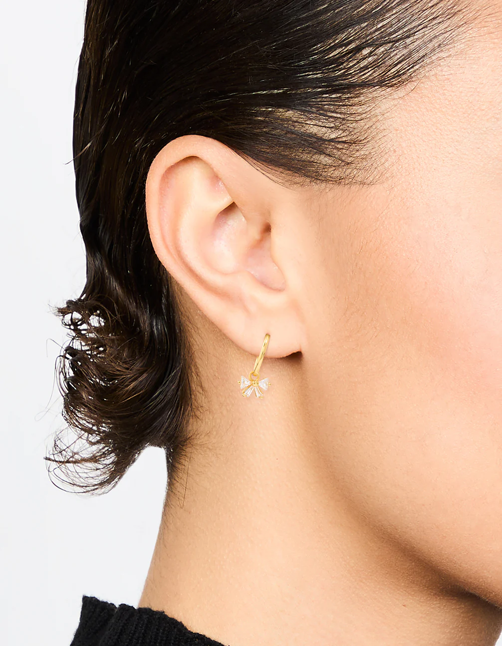 Gold Plated Sterling Silver Cubic Zirconia Bow Huggie Earrings - Image 2
