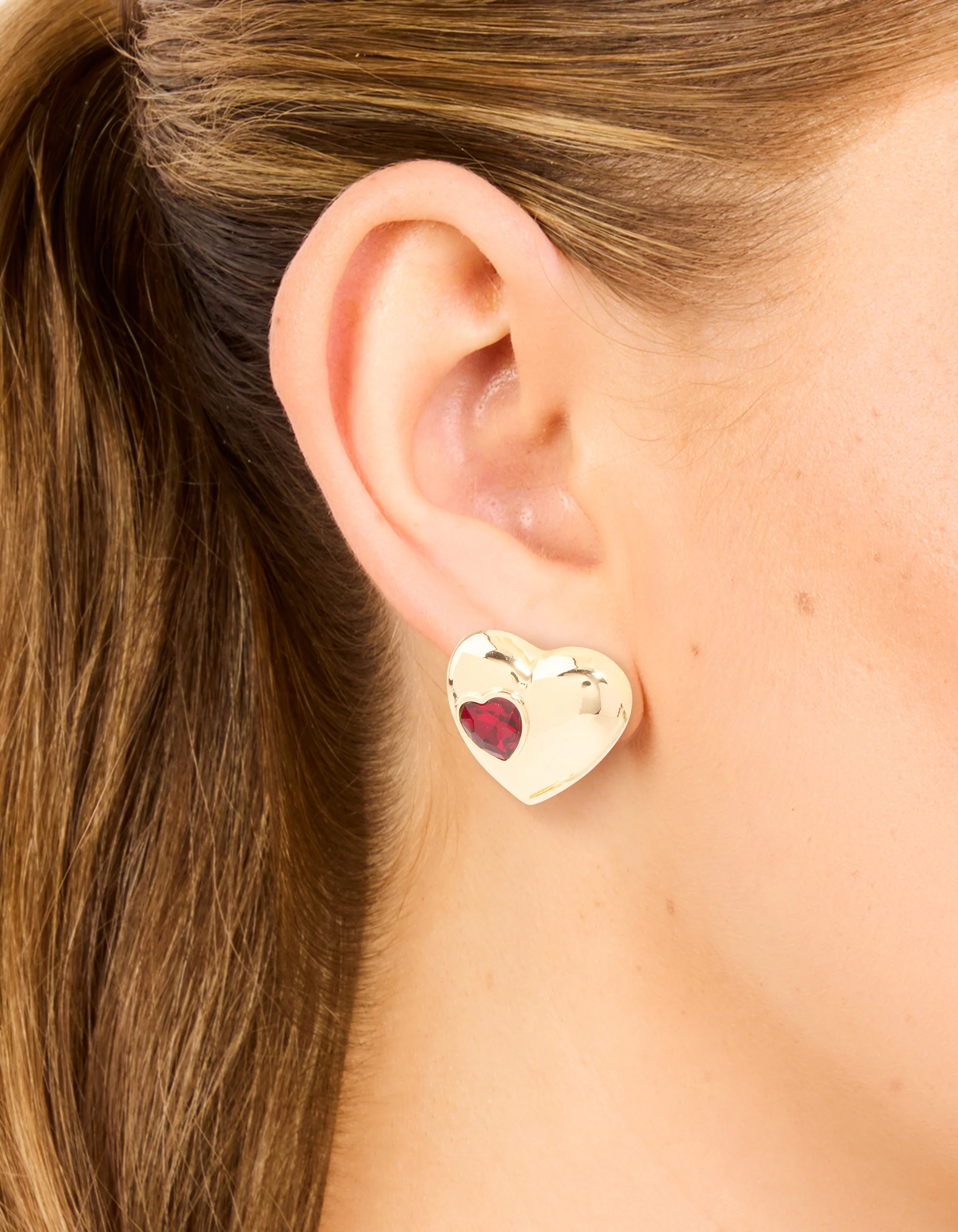 Gold Puffy Heart With Red Diamante Detail Stud Earrings - Image 2