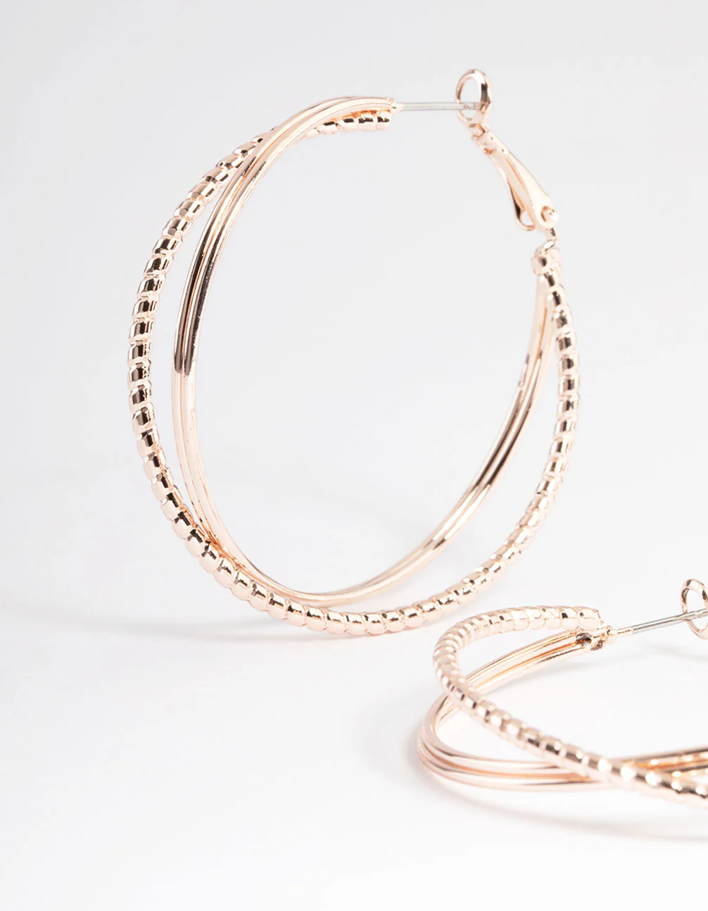 Rose Gold Textured Cross Over Hoop Earrings - Image 2