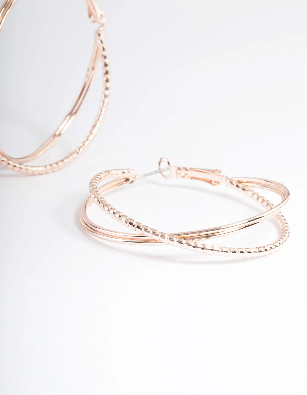 Rose Gold Textured Cross Over Hoop Earrings - Image 3
