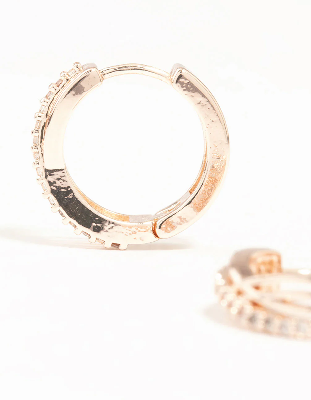 Rose Gold Mini Cubic Zirconia Twist Huggie Earrings - Image 4