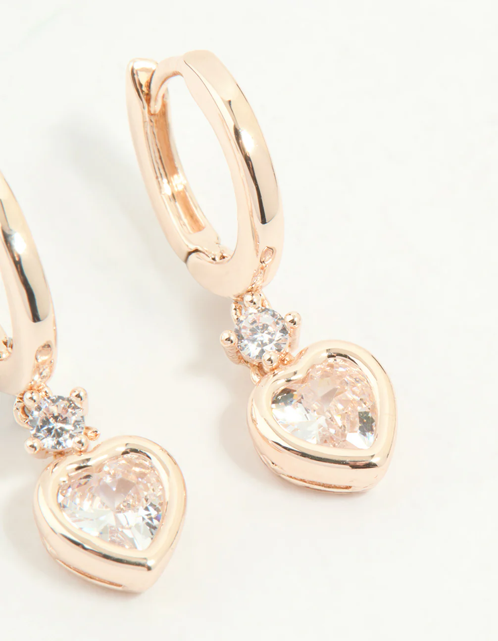 Rose Gold Plated Cubic Zirconia Heart Drop Huggie Earrings - Image 5