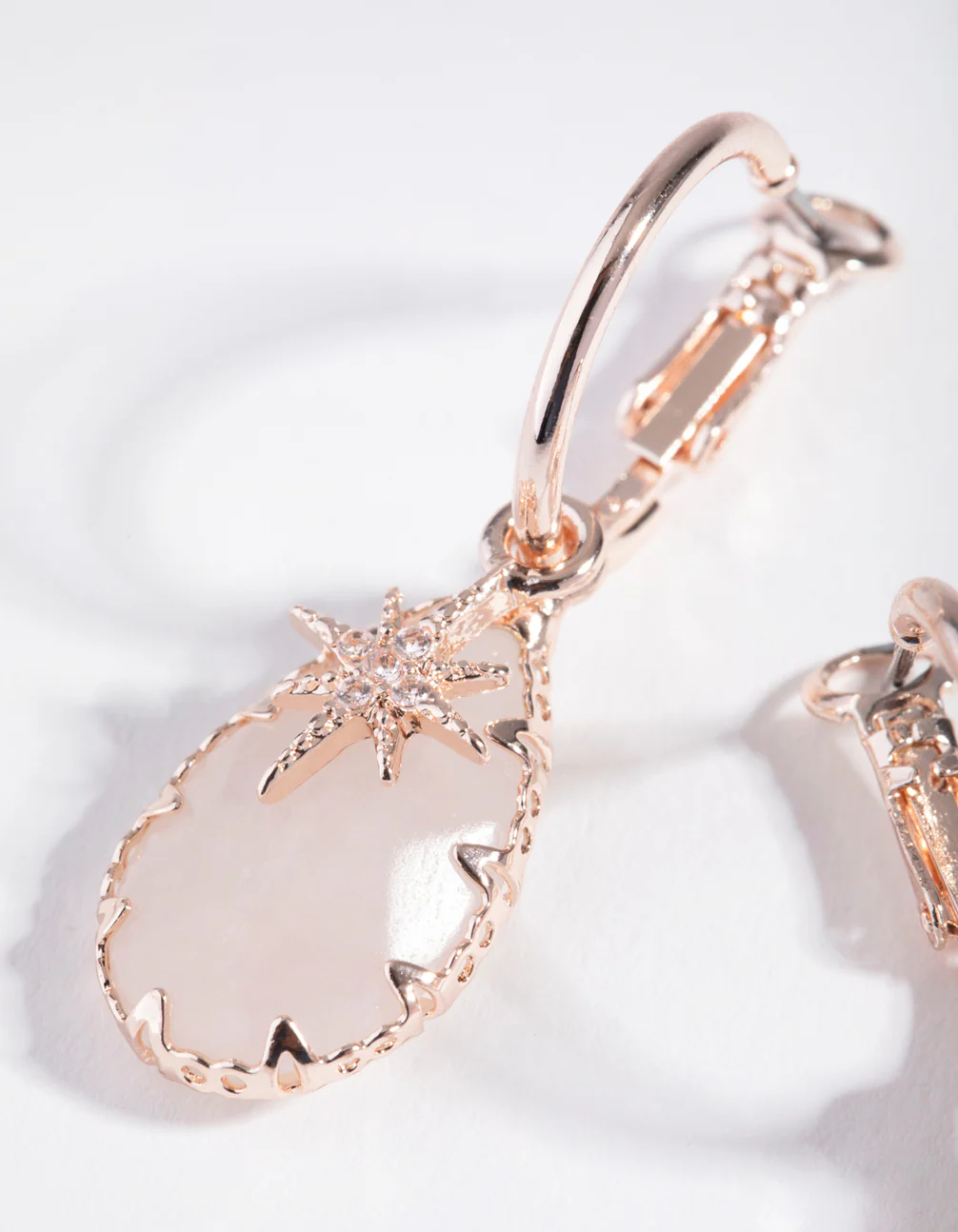 Rose Gold Star Charm Huggie Earrings - Image 2