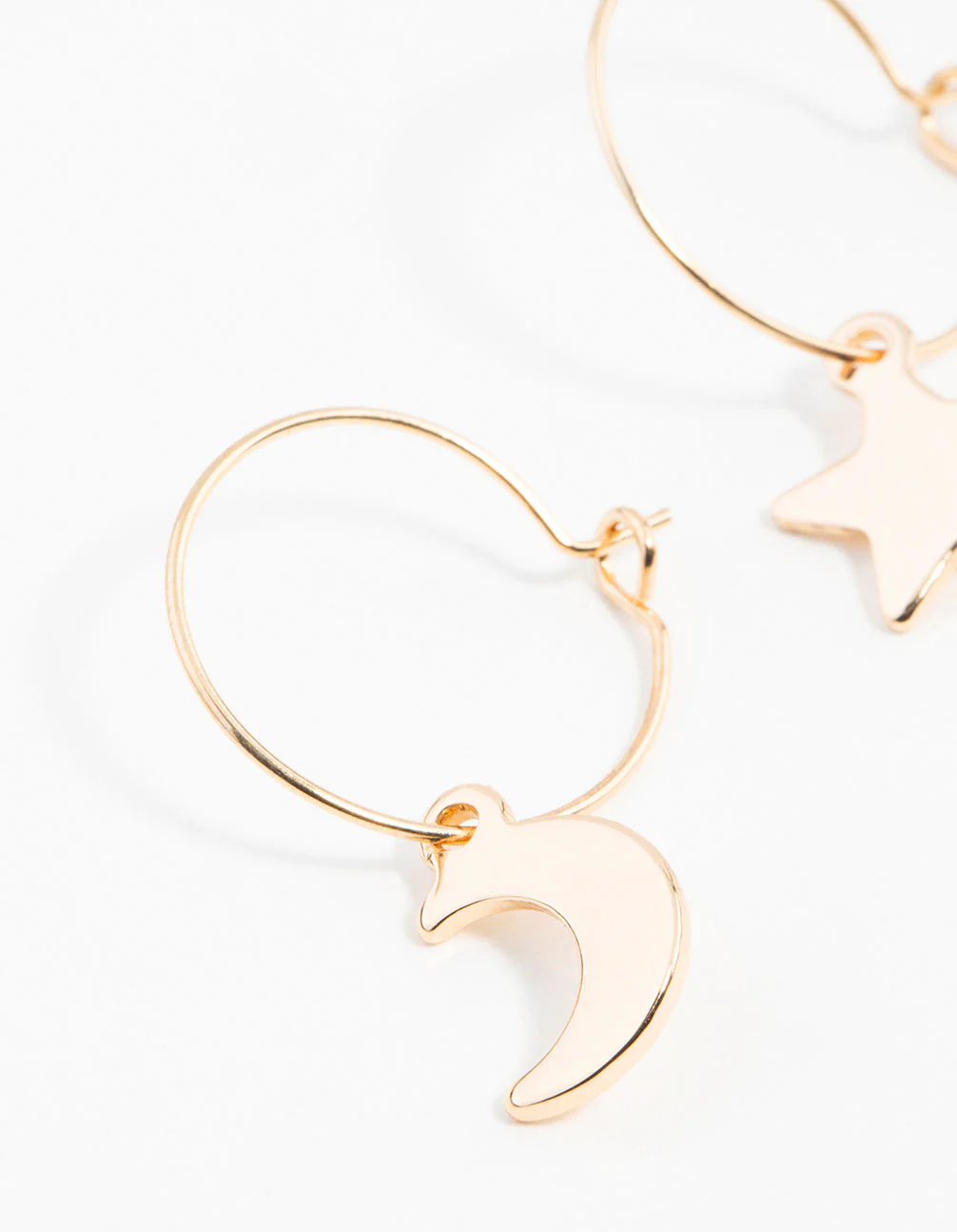 Gold Star & Moon Huggie Earrings - Image 2